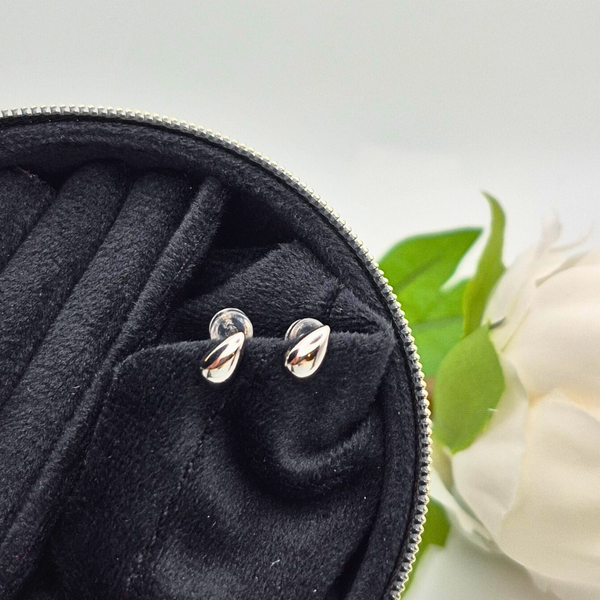 Silver droplet stud earrings UK close up — Morning Dew CZ water droplet studs in 925 sterling silver — Lilies of the Valley