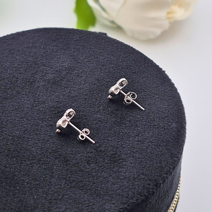 Diamond Blossom Bow - Sterling Silver Bow Stud Earrings