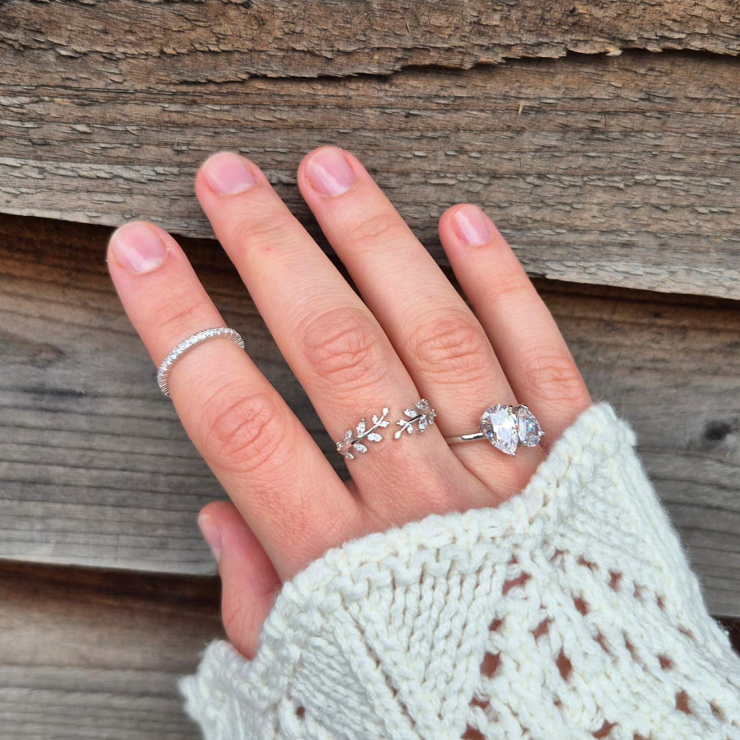 Silver leaf ring UK worn with multiple rings — Olive Whisper adjustable CZ ring in 925 sterling silver — Lilies of the Valley
