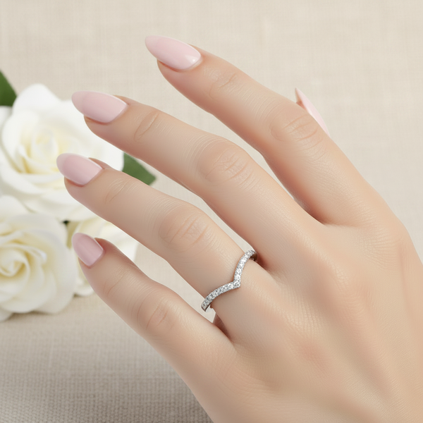 Moissanite V Shaped Half Eternity Ring worn on finger, sterling silver with white rhodium plating, Lilies of the Valley UK